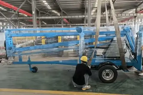 DADE Machinery factory technician assembling dynamic aluminum mast personnel lift