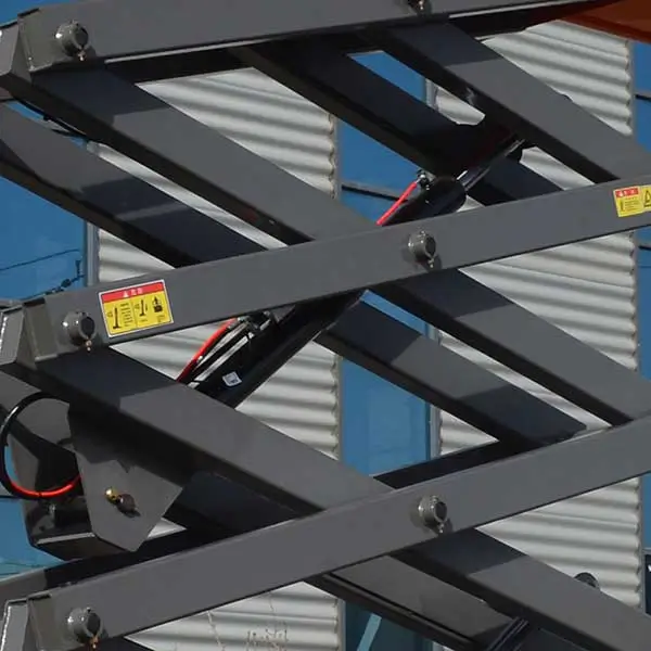 Heavy-duty cross scissor arm linkage mechanism on a rough-terrain tracked lift