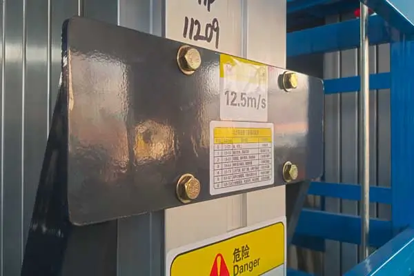 Safety warning labels and operational instructions on aluminum mast lift