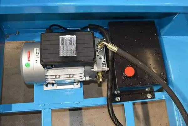 Integrated electric hydraulic power unit pack on scissor lift chassis