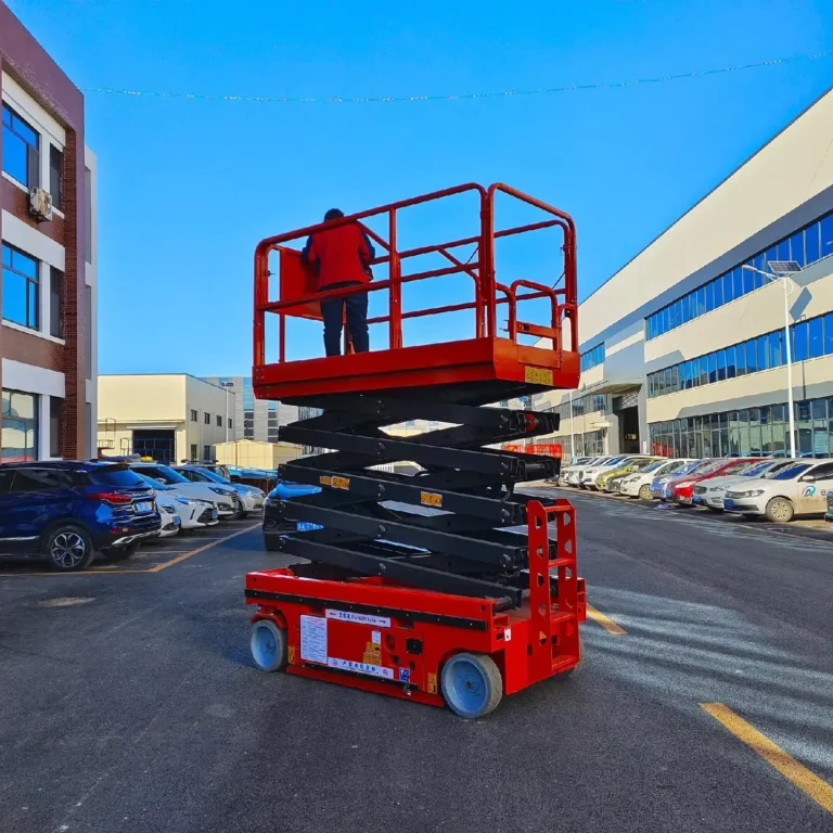 Red electric mobile elevated work platform representing business opportunities to import scissor lift from China