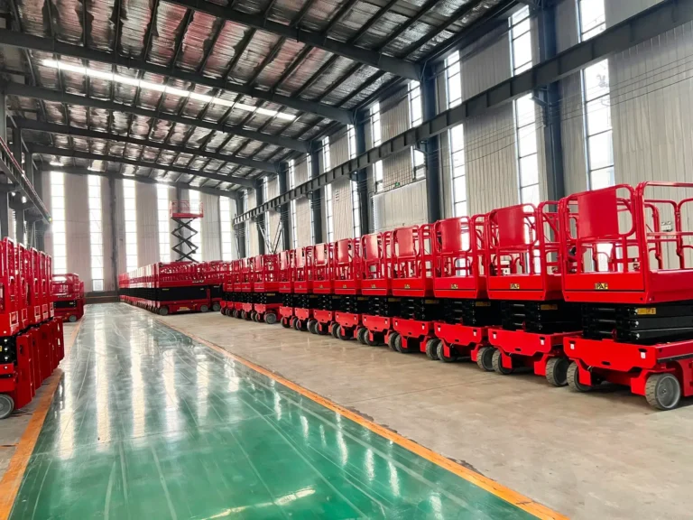 Multiple DADE® Machinery scissor lift supplier stored inside the factory warehouse, ready for international shipment with export-quality inspection and secure packaging.